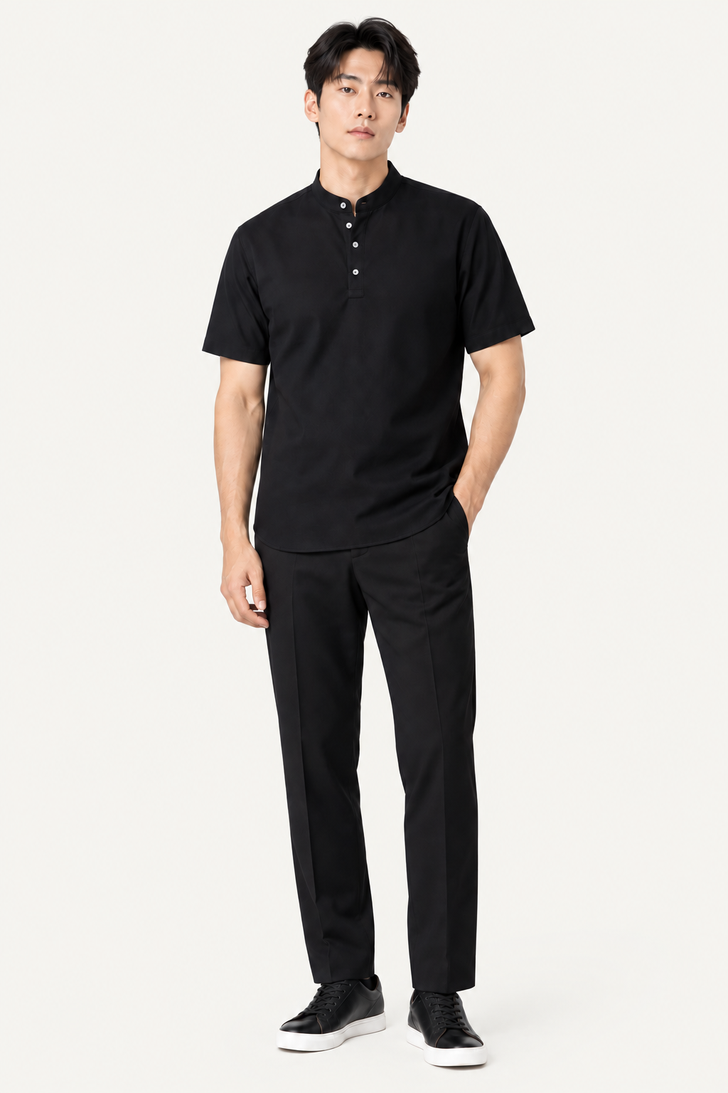 Man wearing a black short-sleeve stand-collar shirt